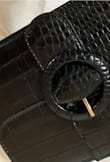Nice size and material. It looks like it will be very durable. Goes well with many outfits. - Marina S.