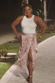 Great material, got tons of compliments, only downside was it was windy the night I wore it so I had to keep holding it shut.. but I loved it - Stephanie H.