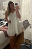 This dress is cute but I found it to be kinda baggy and loose around the chest area where the seam is. It's super cute and the length is perfect but if you are on the edge about size I would size down. It also is not see through - Jenna K.