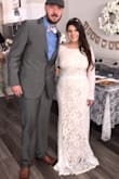 I got a medium in this dress, however I could've fit in a small as I had to have some alterations to make it tighter. I had on 4" heels and only cut the under skirt and the length of the lace was fine. I received so many compliments on how beautiful this dress was and no one could believe what I paid for it! This was high quality for an amazing price. For my small wedding this was absolutely perfect! - Nikki C.