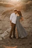 This dress is beautiful! I wore it for engagement pictures and go so many compliments. The color is more true in the second picture! So comfortable and flowy! - Karissa P.
