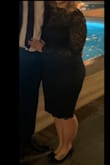 This dress is so comfortable! Normally I'm between an XL and a L so I went bigger this time because sometimes form fitted dresses are too tight on my arms. The XL was perfect for my arms and was still fitted on my body but also gave me room to move. The top lace is very stretchy on the chest so you can breathe. It's the perfect go to dress for any occasion. - Courtney P.