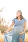I got this dress for my maternity photos and it was perfect! I originally purchased and XL and the customer service team was phenomenal when I had to trade it out for a large. It ended up being perfect and fit my bump so well. - Jessica G.