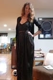 This dress fits loose but that's what I wanted. I added a belt and jacket and wore it to a work event where I received several compliments. It does show some cleavage, but the length and style was sweet enough to compensate for the cleavage. This dress will get a lot of use this summer. And oh yeah, POCKETS! - Samantha H.