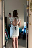 LOVE IT. The open back is elegant and the material is comfortable. Even though it's bodycon-ish style, I don't feel as self-conscious in it as I would in other bodycon dresses. It doesn't ride up like a bodycon either, which is awesome. (I am 5'4") - Veronica R.