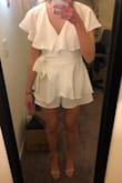 I do not like ruffles very much, but I love this romper! I bought it to use for graduation and I love it. Bonus points that it is not see through - MADELEINE K.