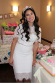 This dress was a huge hit! It fit me like a glove and was very comfortable to wear. The material is soft and the perfect white. Very classy and flattering for my body type. It was perfect for my bridal shower! - Anie J.