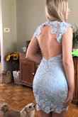 Saw some of the reviews and sized down and ordered an extra small (I am normally a small) and it fits perfectly! Love the open back and I look forward to wearing it at an outdoor wedding. - Claudia S.