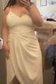 I love this dress! I was in between getting a large or x-large and I am so happy I got an XL it fits perfectly. For reference I am a true size 12 in jeans and usually wear large bottoms and medium-large in tops. Also so perfect that the straps are adjustable no need to wear a bra which is great for us big chested girls! I will be wearing it for my college graduation. - Kristen C.