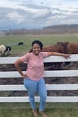 The shirt is awesome. I ordered a large, it was a little tight in the arms and it stopped perfectly at my waist. The X Large probably would've fit perfectly. Overall, I felt and looked pretty in the shirt. - Kamilah Y.