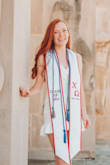 Super comfy and adorable dress! I really liked the ruffles on the bottom that gave it a little dainty touch. It was a little long on my short legs, so I pinned it up a little so it looked like my legs were longer. Would recommend to anyone and worked great for grad photos! - Hailey D.