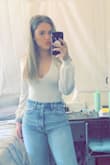 I love this bodysuit! The fabric is super soft and of good quality. It is not see through. I would order this same shirt in other colors. - Camille P.