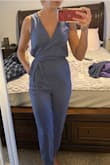 This jumpsuit is super cute and I love that you can wear a bra with it. The only reason I didn't give it 5 stars was b/c the material wrinkles easily. Other than that, it's great! - Kimberly P.
