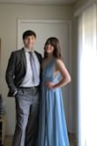 I wore this for a wrap party event. I'm a huge fan of blues, so I was very happy to see this color available. When you walk in this dress, the way it trails behind you is so beautiful; you feel very goddess-like. The material underneath is heavier than you think, so it does feel a little more weighted while the top layer flows very elegantly as you move.
The only discrepancy I had was that the chest was looser and the waist is tighter. So I would buy it based on your waist size rather than your bust, because you will have plenty of room in the chest. If I had worn an appropriate bra, then I think I would have filled it in better. (I went without one, so was a bit droopy looking haha) It also was longer on me, so I recommend hemming it at the bottom.
Regardless, it's a beautiful dress. :) - Elise F.