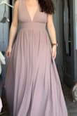 This dress is just as beautiful as I hoped it would be! I would say, the picture shows it as a little more brownish, & it's a bit pinky. The straps are just the slightest bit loose, so I will be getting them altered to fit me. Beautiful quality! Love it! - Jordan R.