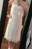 I don't love it, I don't hate it. I ordered a small and a medium, and the small was a little too big, so I didn't even try on the medium. It lags nicely in the bust area, so I'm not sure I would want an extra small, but it adds a couple unwanted inches in the waist. The lace feels nicer than some, but maybe not as nice as the price indicates. My mom told me I looked like I was wearing a towel wrap, so I will be returning it, but I still think it could be pretty (was considering for my bridal shower). - Samantha O.