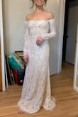The arms fit nicely (not too loose) but the lace detail on the neckline looked sort of odd, like if I kept this dress I would have cut them off. Tight on my chest, even though I have a small bust. - Anna G.