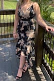 Dress is super cute, and comfy! I ordered a medium because the large would have been too big in the bust area. It fit a little snug but it wasn't too bad, it outlines my curves perfectly! - Isabel R.