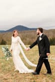 I got this dress for a styled wedding shoot I put on as a wedding photographer. I was so impressed with this dress. I ended up buying it based off of review photos. I feel like the actual website photos are a bit odd. A few review photos sold me on it though. If you want to save money on a wedding dress, no one would know this is only $125! Such a good value. The model who wore this was torn between a small and medium but she definitely needed the medium. I these may run a bit small in general, but it fit her great and was very flattering. So happy! - Melissa S.