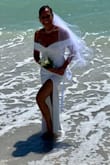 I bought an expensive wedding dress but then came across this company. All I can say is WOW!! The fit, the material, the comfort, price and of course how sexy but classes it was.  I am so happy I bought it. We had a beach wedding and it was perfect!  Show stopper! - Doreen K.