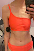 I was so excited about this top. The color was beautiful  very vibrant and neon. However the material was so thin and did not have padding. You could see everything underneath of the material. I'm all for free the boobs but this was almost see through. - Tara R.