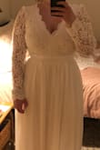 I LOVED the back and sleeves on this gown. Truly stunning. But the style of the front of the dress did not work for my large chest - it accentuated it so much that it made them look even bigger than they are. But the back was truly beautiful. - Haley H.