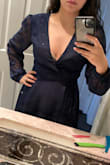I really wanted to love this dress, it fit well everywhere but the neckline, why so low? I'm almost flat chested and my bra was still exposed, do I go braless? I tried to add a safety pin but that just looks tacky - Evelyn R.