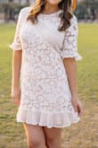 Wore this for my grad pics and it was a great dress. I sized up to an XL because of reviews that said it had no stretch in hips or bust (I am normally a L). The XL fit my bust perfectly but it was a little baggy in my wast and hips. I pinned the dress in the back to give me more shape in my waist and it worked perfectly! - Mackenzie S.