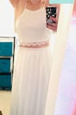 Purchased for my upcoming wedding. Will need to have the skirt hemmed (stood on a stepper to get a more accurate idea of the fit/photos of it) and the top needs to be taken in a bit but overall I love this set. Even before personalizing, the fit is super flattering. Can't wait to see what it looks like after tailoring. - Kylee H.
