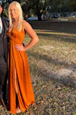 I got SO many compliments on the color and style of this dress! The top part was a little loose on me so I had to put in some safety pins, and it was long without wearing heels but other than that I absolutely loved it! Everyone at the wedding asked me where I got it :) - Gabbi J.
