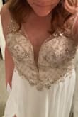 Lovely details. Very comfortable. I ordered an 8 but I couldn't get it zipped up all the way, I had to return for a 10. I have a wider rib cage and there's no stretch in the material. Hopefully the 10 works because I loved the dress other than that. - Alisha D.