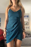 It's really cute fits pretty okay it's just loose on the hips....I'm probably wearing it to my graduation but when I sit down the front kinda unfolds backwards. - Emma J.