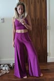 Exactly as pictured. Very fun outfit, I got a lot of looks and compliments on it. I dressed it down for brunch with flats but the pants are definitely long enough for heels. Color is great, can also mix and match the pieces. Overall I love it. - VERONIKA V.