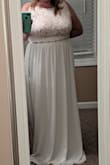 The dress is very comfortable and pretty. I should have paid more attention to the suggested cup sizes for the dress. I am a DD. If you are large breasted, you might want to order a size up. - Kimberlee T.