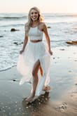 This two piece set worked so well for our engagement photos! The waist was a perfect fit and the skirt material had good weight to it and felt like good quality. I had to take in the top on the sides myself to give it enough support to wear braless and have the back not too cinched up. Overall, I would buy it again! - Elena W.