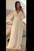 I am usually 5'7 132lbs I currently weigh 157lbs and I ordered this dress in a M to wear to an event and it fit so beautifully. Absolutely loved it but I decided to go with a different look (fitted to show my bump). 

Absolutely beautiful dress! And if my baby shower wasn't in June would most definitely wear. 

Highly recommend, nice fabric for the price. Best lulus dress I tried on (ordered 7) - Cali G.
