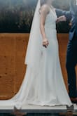 Was looking for a wedding dress and this caught my eyes. The reviews of other brides helped make decisions very easy.
Opt for int. express shipping and received it within a week.
The fit is not perfect so I had to alter it BUT the dress is already well made. The fabric is good, lace is super pretty (not the cheap kind). 

Do note there is no padding so you gotta get a bra that will keep your boobs in shape without straps showing.

I also topped it off with a pearl veil.
I loved it. - Thinn T.