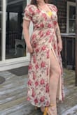 This dress is well made with quality fabric and so feminine! Light weight and lined. It flows beautifully, but the wind won't pick it up easily. It's a little on the larger side but that's ok because my chest needs it. Fabulous job Lulus! - Nadia T.