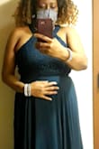 The dress has a unique style and a very easy flow.   I have a big tummy and yet the dress fit beautifully.  I particularly love the cut of the bodice and the intricate details of the top of the dress.  I wore this to a wedding in Texas. - Alexia H.