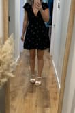 Beautiful material. Very flattering on. Love this one. The print is very pretty too. - Olga P.
