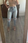 I wasn't sure I was on board with the mom jeans trend but these have me sold. The material fits and feels great. It has a slight stretch which makes them comfy. I'm a little concerned they may loosen as I wear them but I have a feeling the loose fit will still look good. For reference I ordered a size 5. Have an athletic build with some booty and thicker in thigh area. 


***Also it auto selected 22 waist for me but that's not correct. Not sure what it is but bigger than that - Ashley T.