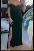 Beautiful dress! I love the color and the fit. It has little elastic at the top so the dress doesn't feel like it's going to slip down. Getting a small instead of the medium may have been better for a tighter fit for me but it still fits really well! - Mckenna P.