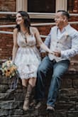 Renewed our vows in Nashville and this was the perfect dress for a southern casual wedding dress to go with cowboy boots. Quality was great, loved the layers with the tulle that made it just dressy enough. Not see through at all and the adjustable straps are a must! I wore breast petals because it's a good plunge on the neckline. I ordered a small to be sure I didn't have to do any alterations and ensure it was snug in the chest. - Tina R.