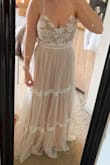 This dress is truly stunning. It's even more beautiful in person. I love the pink undertone. Wearing this for my elopement ceremony. My bust is a 40G and it was a bit tight on me. I almost didn't get it on! But this is the first dress I'm able to wear without a bra! Super happy about that! - Brittany M.