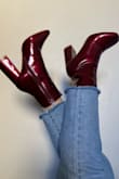 Genuinely my favorite new shoes. I can usually fit between a 6 or 7 but the 7 fits me perfectly. They are a nice wine red color but in the sunlight, they can look a little brighter. Walked around for a while and wasn't uncomfortable at all. Absolutely obsessed. - Jen Y.