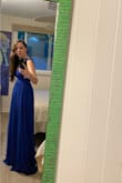 I really loved this dress. I used body tape to keep the bust area in place because it was a little big for me but I really loved the way it looked. It was a little long but just right with super high heels. - Maria Z.