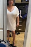 I really like this dress. I would say it would be too short for a tall person but hangs very nice. If you are between sizes definitely size down. - Jamie A.