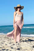 Perfect lightweight and stylish cover-up. I wore it on my trip to Miami and it was cute, flowy and comfortable. Loose fitting but the adjustable straps allow you to tighten it to your liking. - Cathy C.