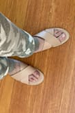 These shoes are SO comfy. I don't think they're the most flattering shoes and they feel a little loose, which is surprising to me because I have very wide feet but in spite of all that, they are super comfortable to wear running errands or just around the house. I highly recommend for comfort. - Dana S.