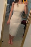 This dress has a beautiful back detail that keeps its shape but is NOT made for a 5'2 girl. I ordered an XS size knowing it would be a tad long but the dress went past my calf. There is no way to wear a bra or underwear without it being seen as well. You need, however, to wear a bra with this dress due to little to NO support up top! Would NOT recommend it. You can see every bump, lump, and line due to the thin material. Sending back and not ordering this dress again! - Morgan G.